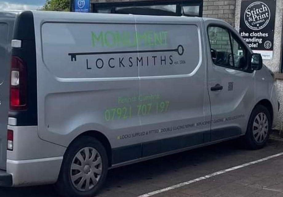 Side of the Monument Locksmiths van on a job in Cumbria